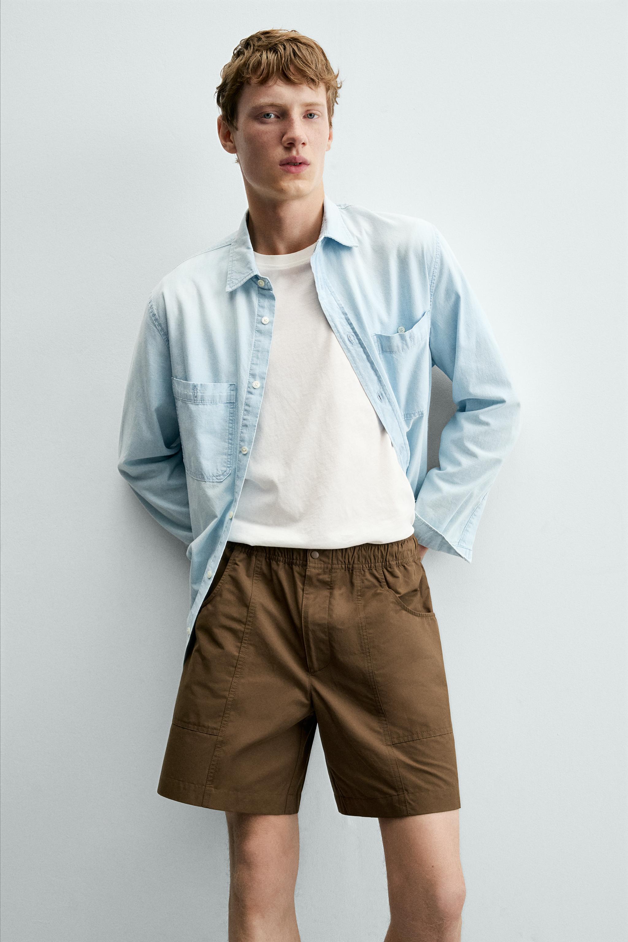 SEAMED SWIM SHORTS
